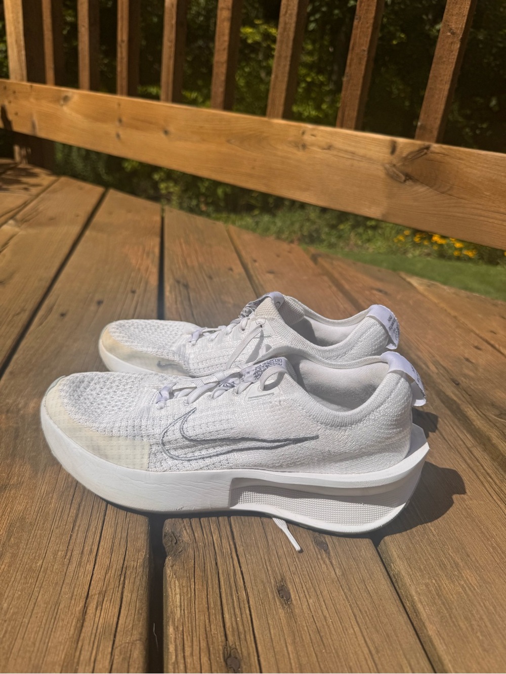 Nike Women's White Athletic Running Sneakers with Subtle Silver Swoosh